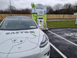 White EasyGo car plugged into charging point at Lidl