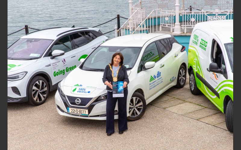 Lettie McCarthy pictured in front of electric vehicles