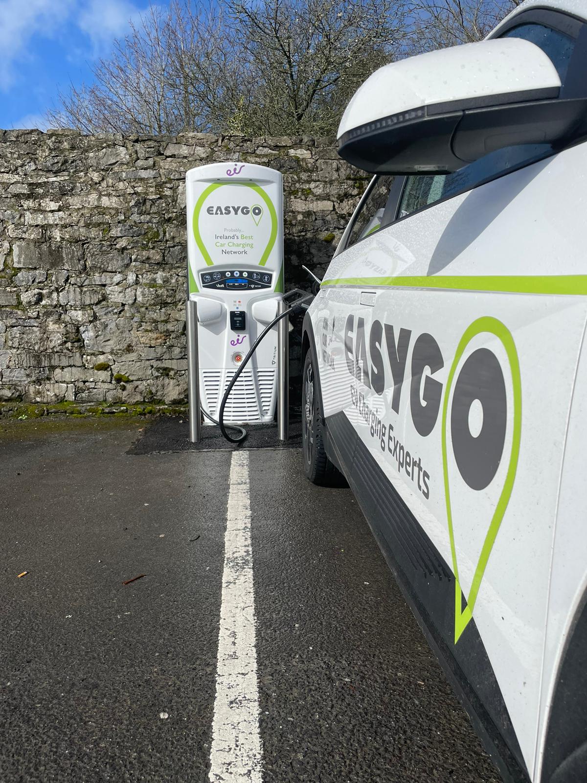EasyGo car pictured beside EasyGo and eir electric charger
